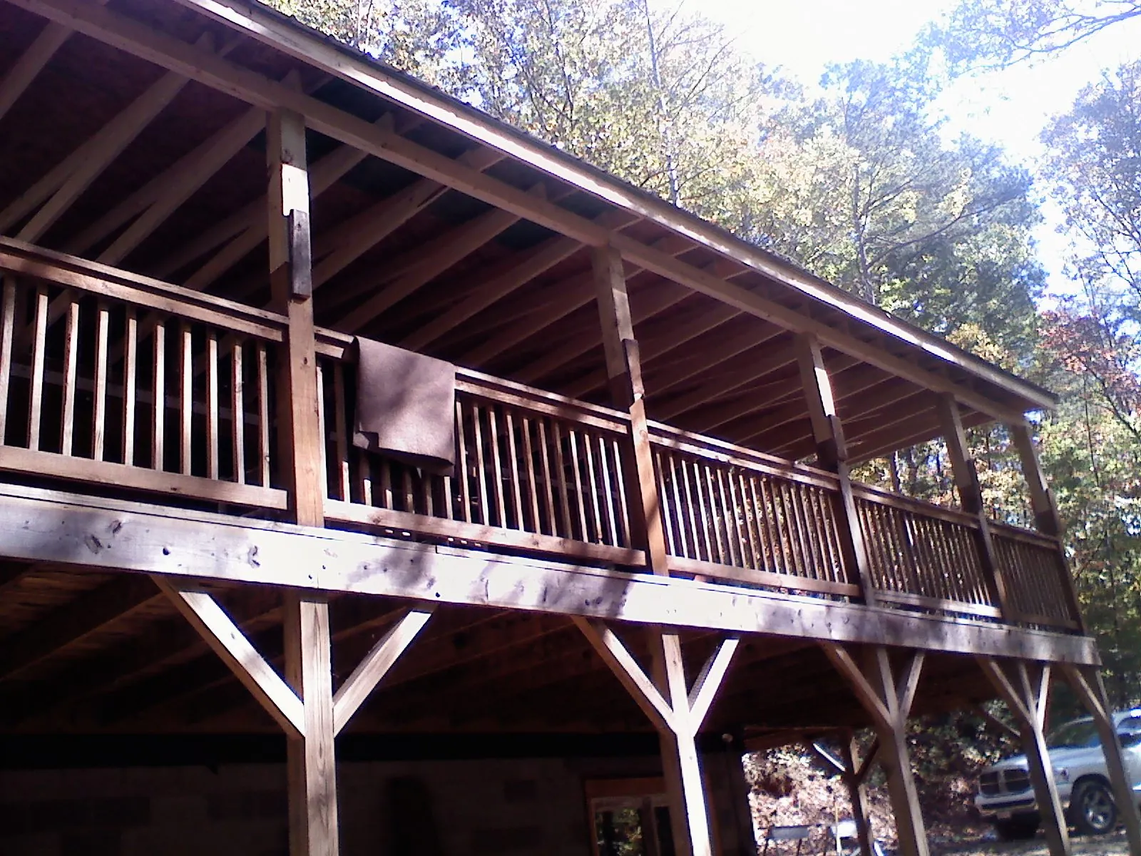 Timber framing under a new elevated porch and deck — Roof Leak Repair in Mcpherson by Roofing Brothers